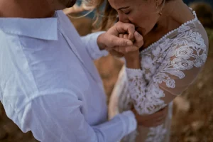 dreamy wedding photographer europe A bride kissing his husband in emotional way