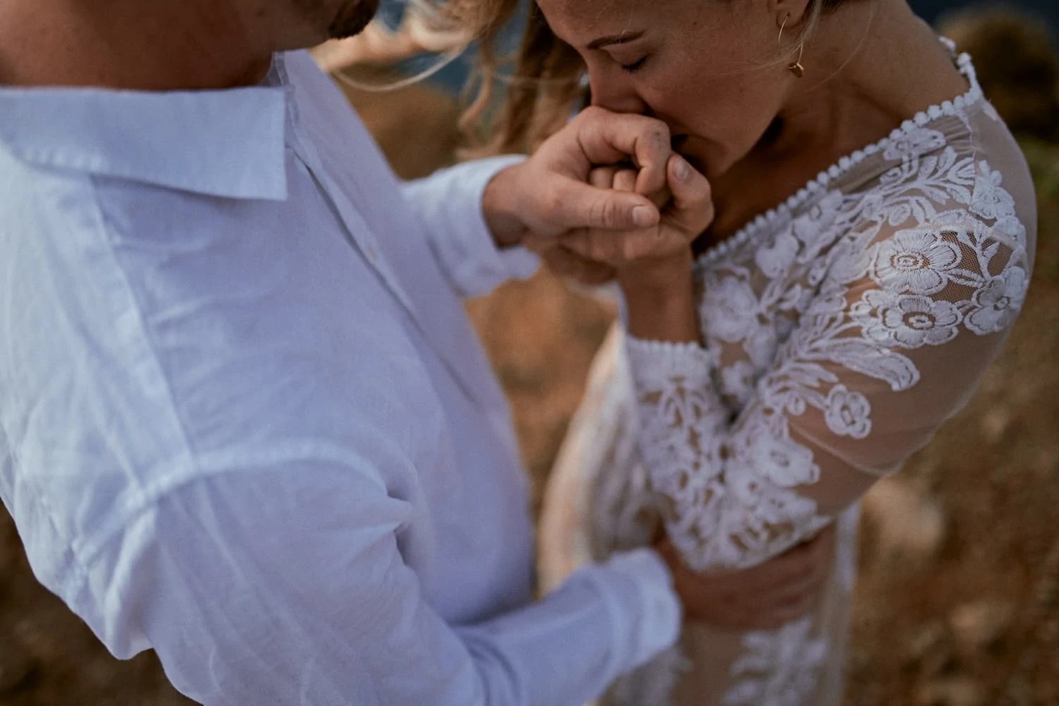 dreamy wedding photographer europe A bride kissing his husband in emotional way