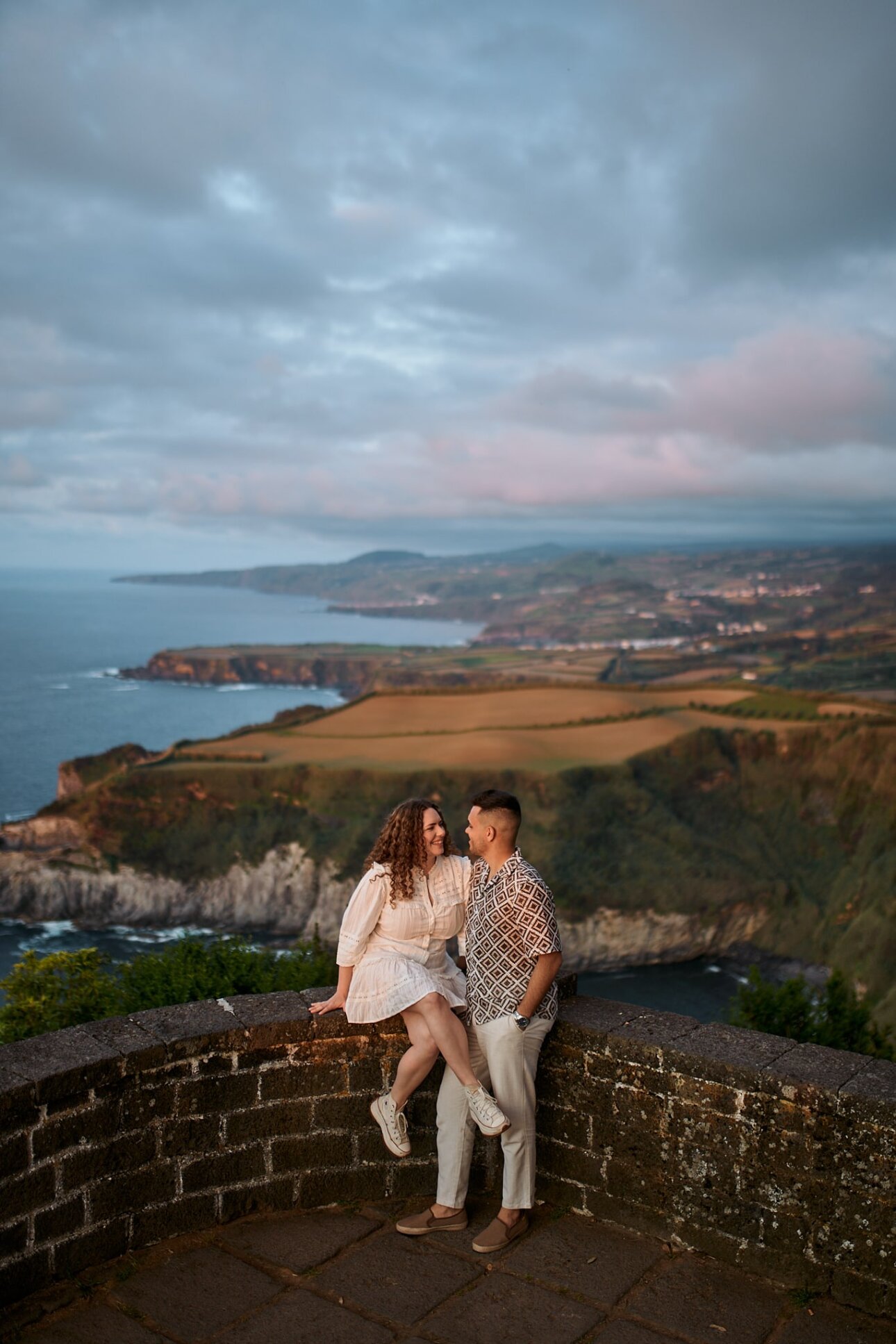 Engagement session at the top of the castle in cornwall.